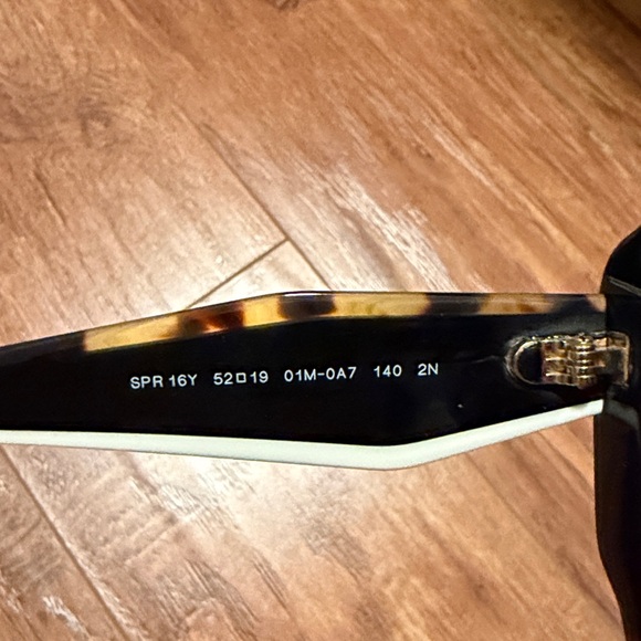 PRADA | Women's Black and Tortoise Shell Sunglasses with White accents - Picture 12 of 12